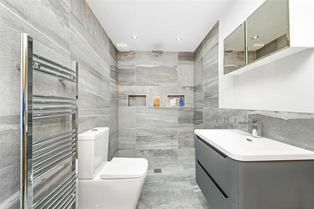 BEDROOM ONE EN-SUITE SHOWER ROOM