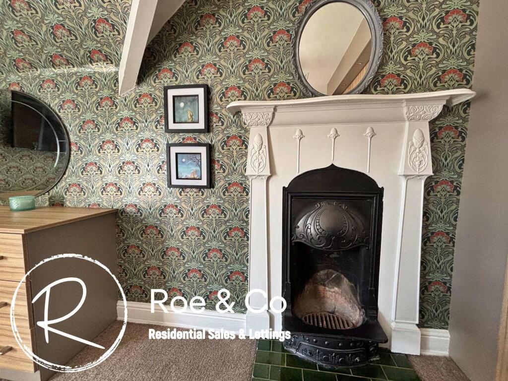 Bedroom one fireplace