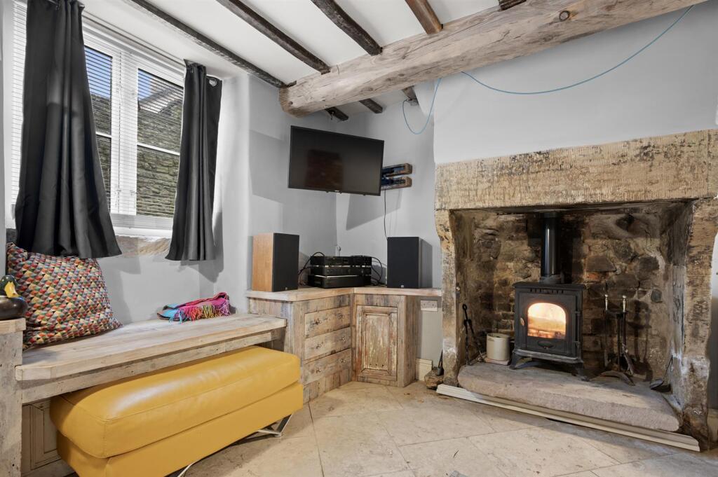 Sitting Room - fireplace and window.jpg