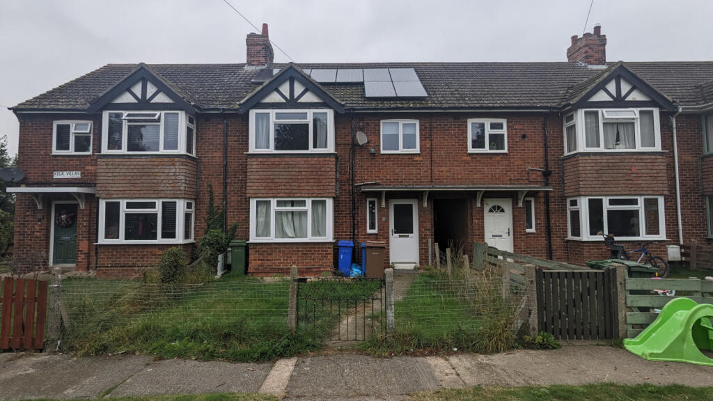 A three-bedroom mid-terrace house