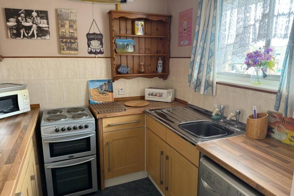 Flat 206 Guildbourne Court, Guildbourne Centre, Worthing, West Sussex, BN11 1LZ