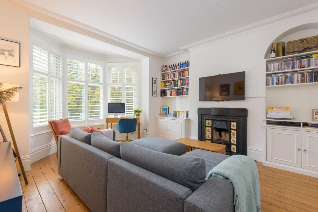 SITTING ROOM AND DINING KITCHEN