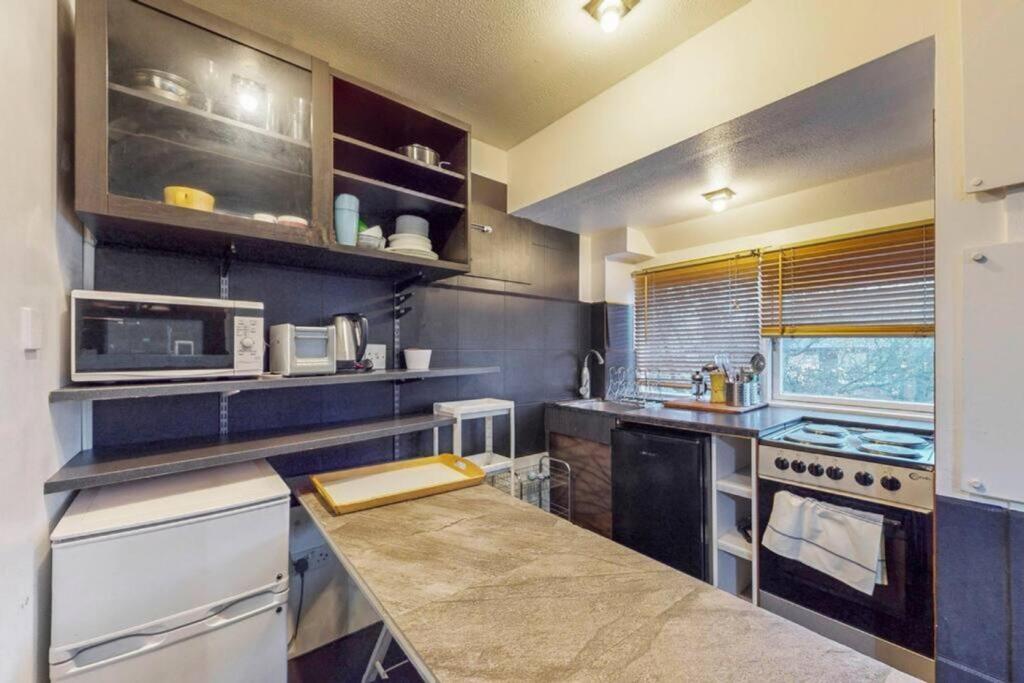 A functional kitchen with ample storage and nat...