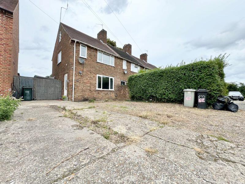 Front garden and parking view 2