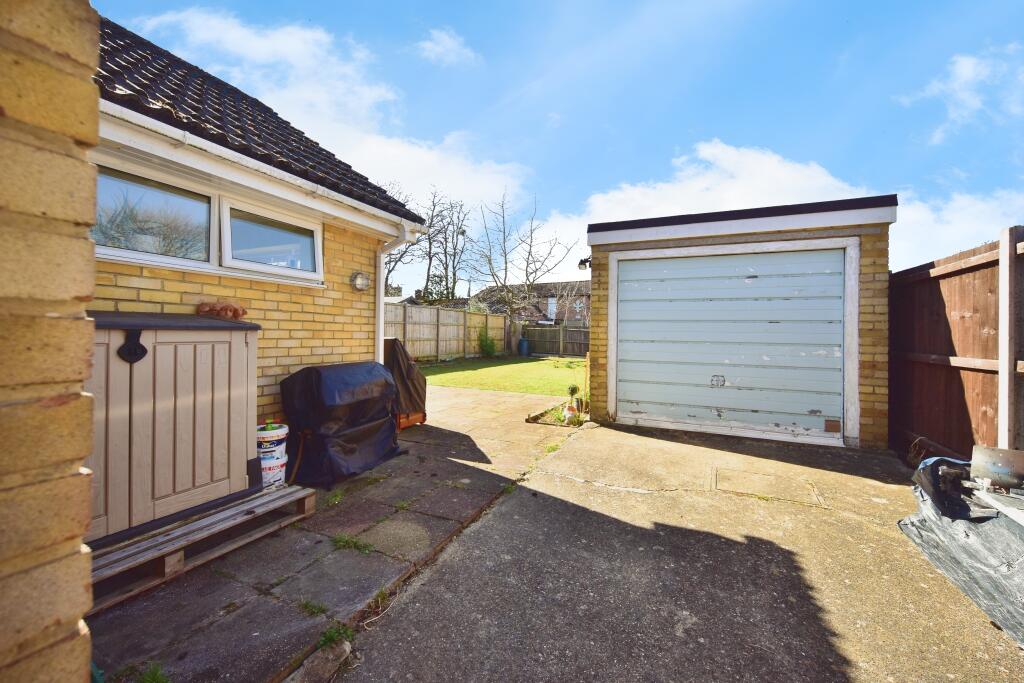Private Rear Garden With Garage View