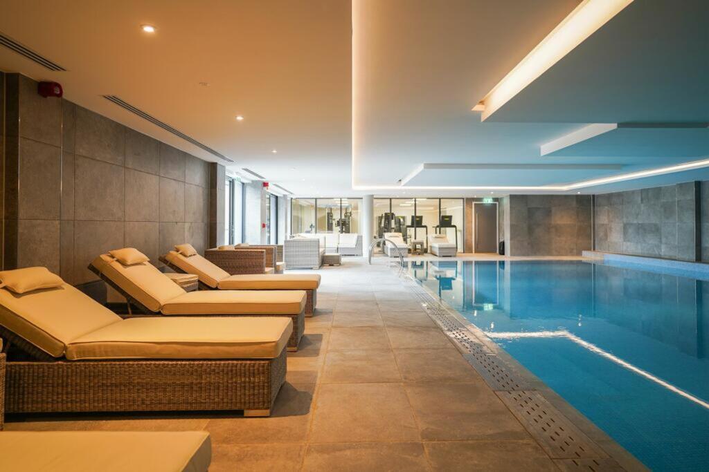 ON SITE SWIMMING POOL AND GYMNASIUM