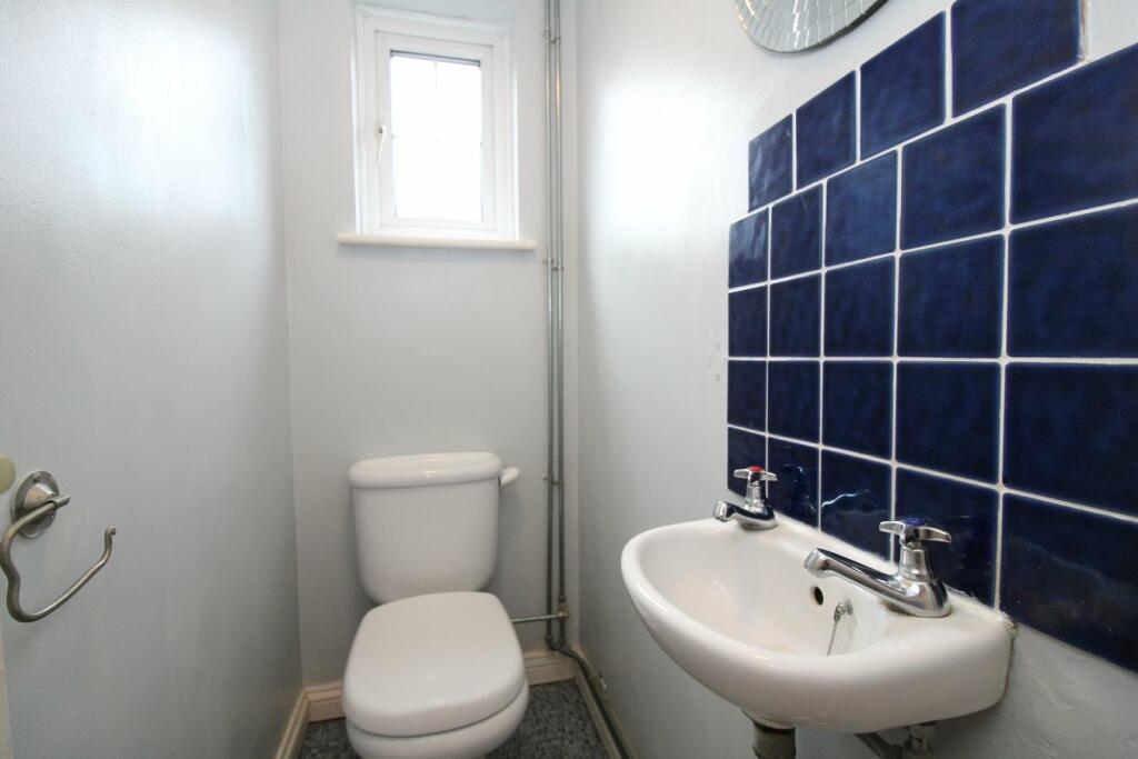 DOWNSTAIRS CLOAKROOM 