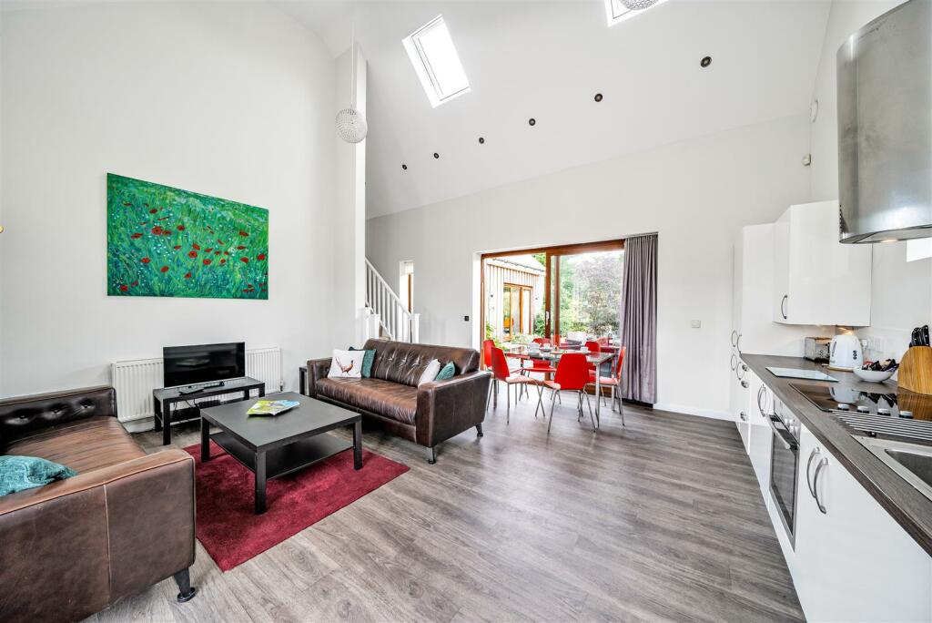 Open plan sitting/kitchen/dining area
