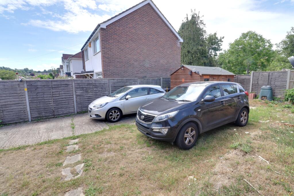 REAR PARKING/DRIVEWAY