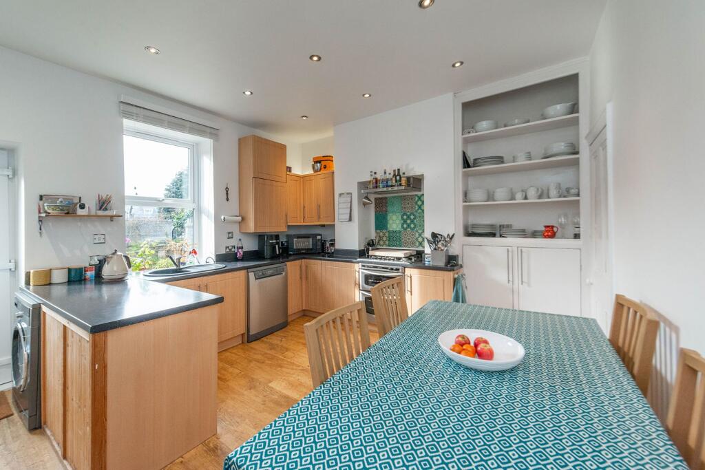 SITTING ROOM AND DINING KITCHEN