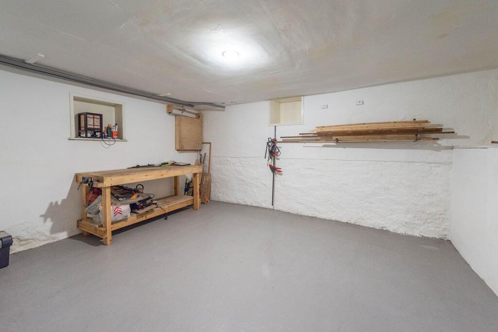 FOUR USEABLE CELLAR ROOMS