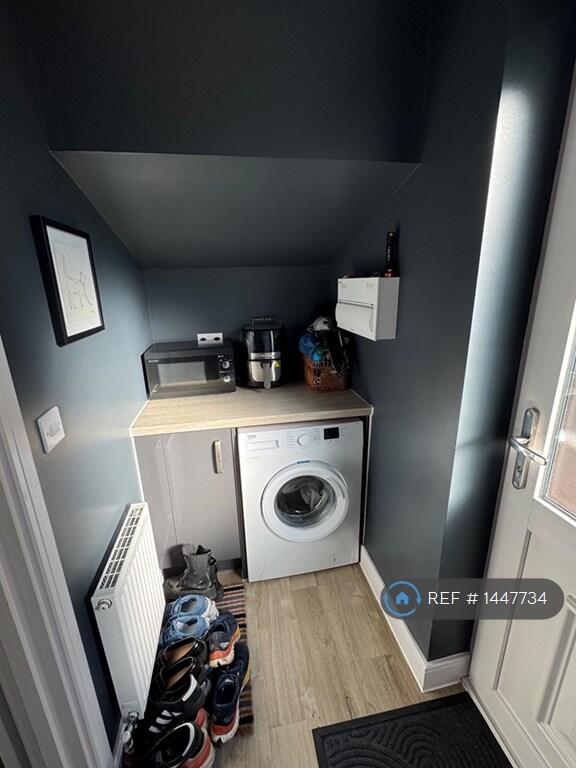 Utility With Side Door From Driveway