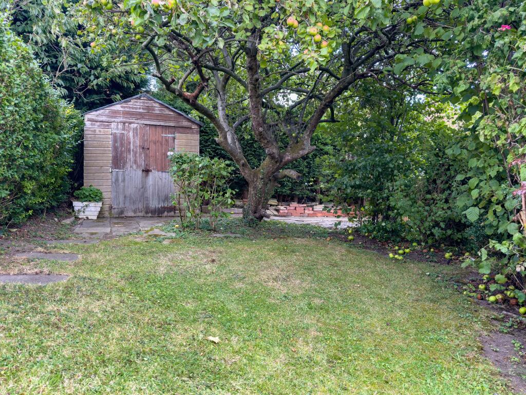 Lawned garden to the rear