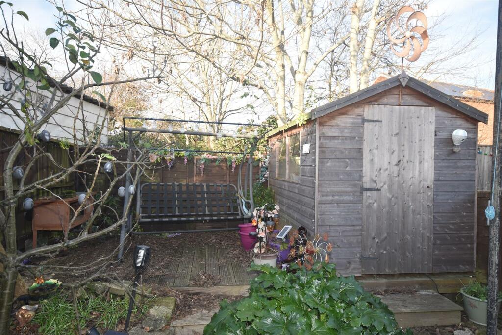 Garden deck &amp; shed.