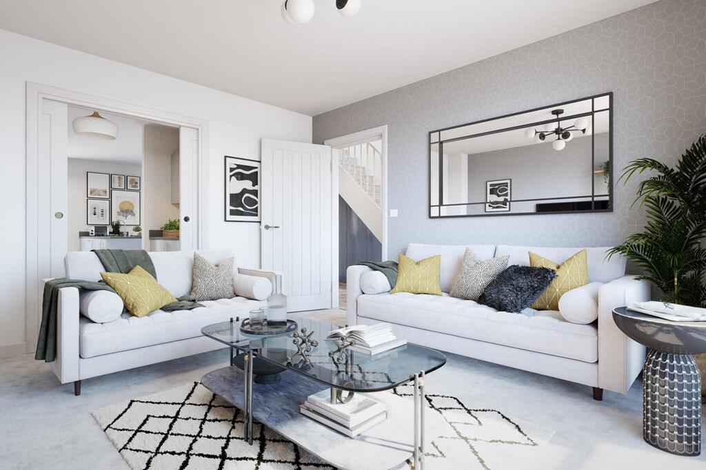 A spacious lounge with sliding doors leading to the kitchen