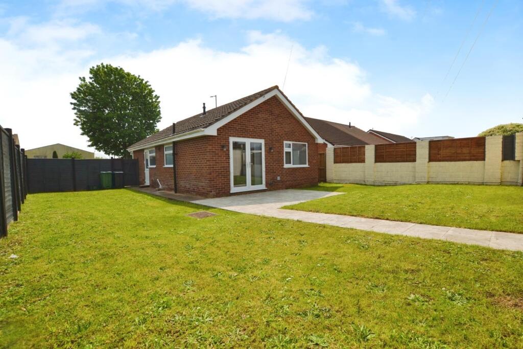 SIDE AND REAR GARDEN