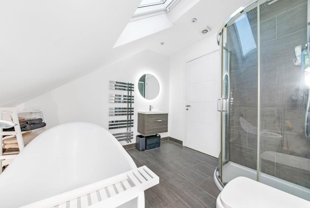 BEDROOM ONE EN-SUITE BATHROOM