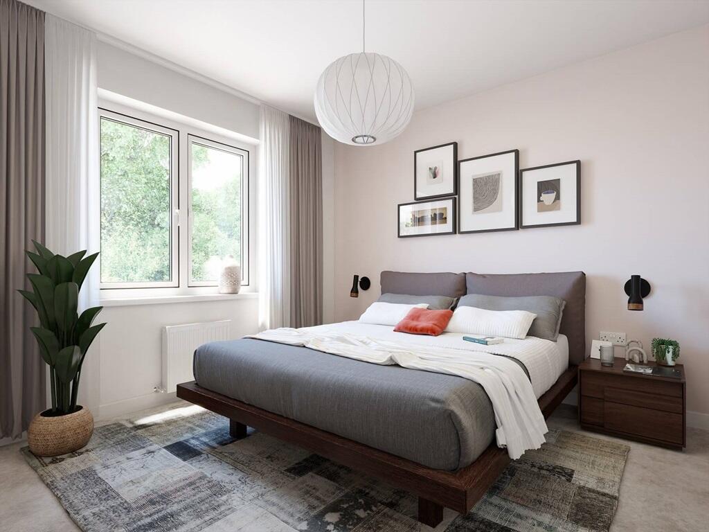 Bedroom 2 also features an en suite shower room - typical Taylor Wimpey home