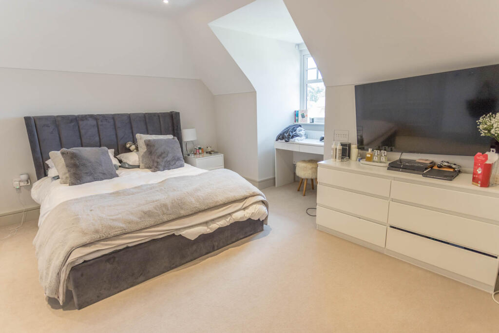 Bedroom 2 with wardrobes