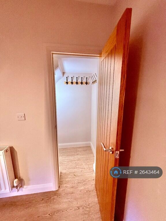Door To Understairs Cupboard 