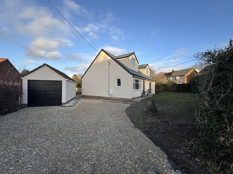Side, Garage and driveway