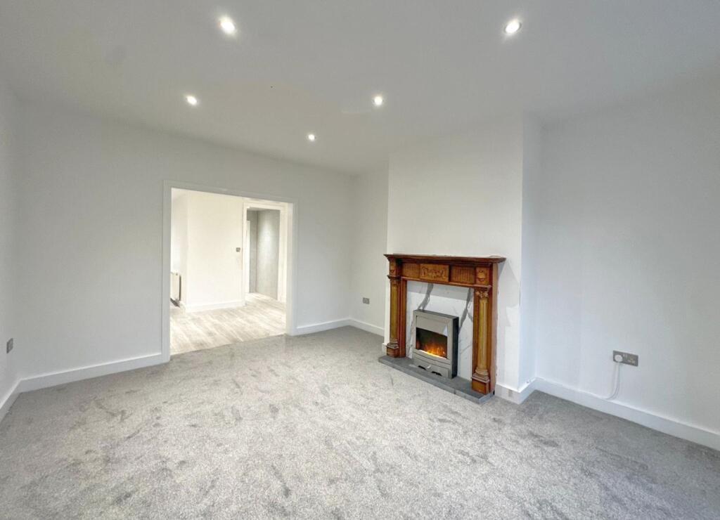 Lounge showing kitchen