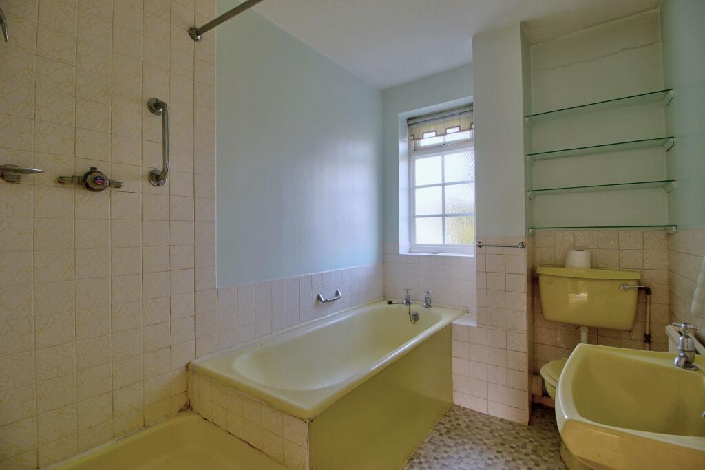 Bathroom with shower and bath tub