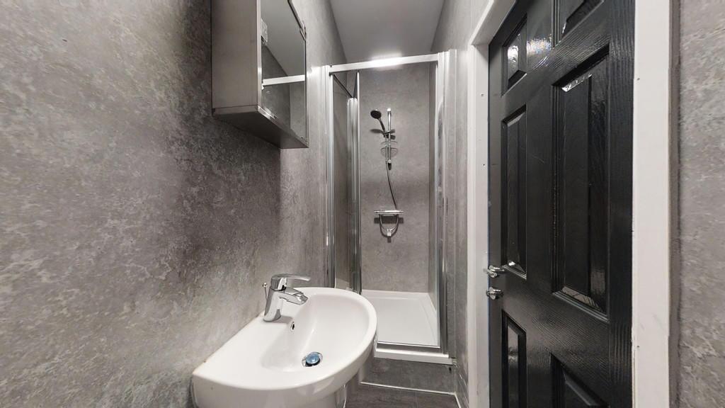 A modern and well-maintained bathroom featuring...