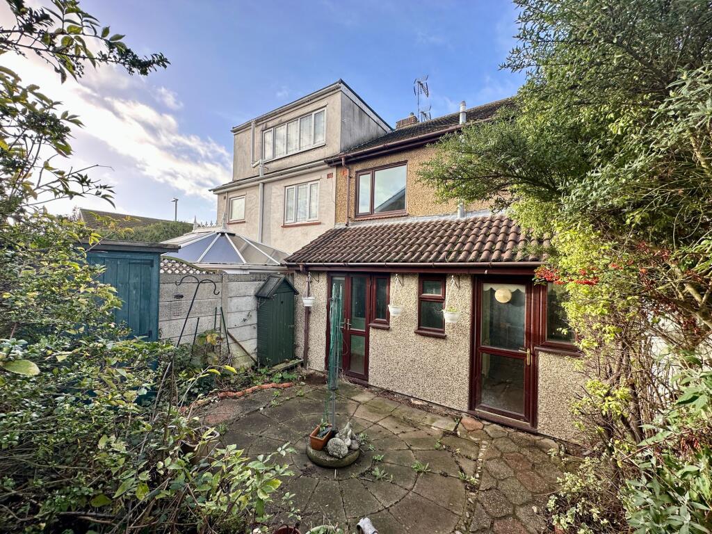Rear looking to house