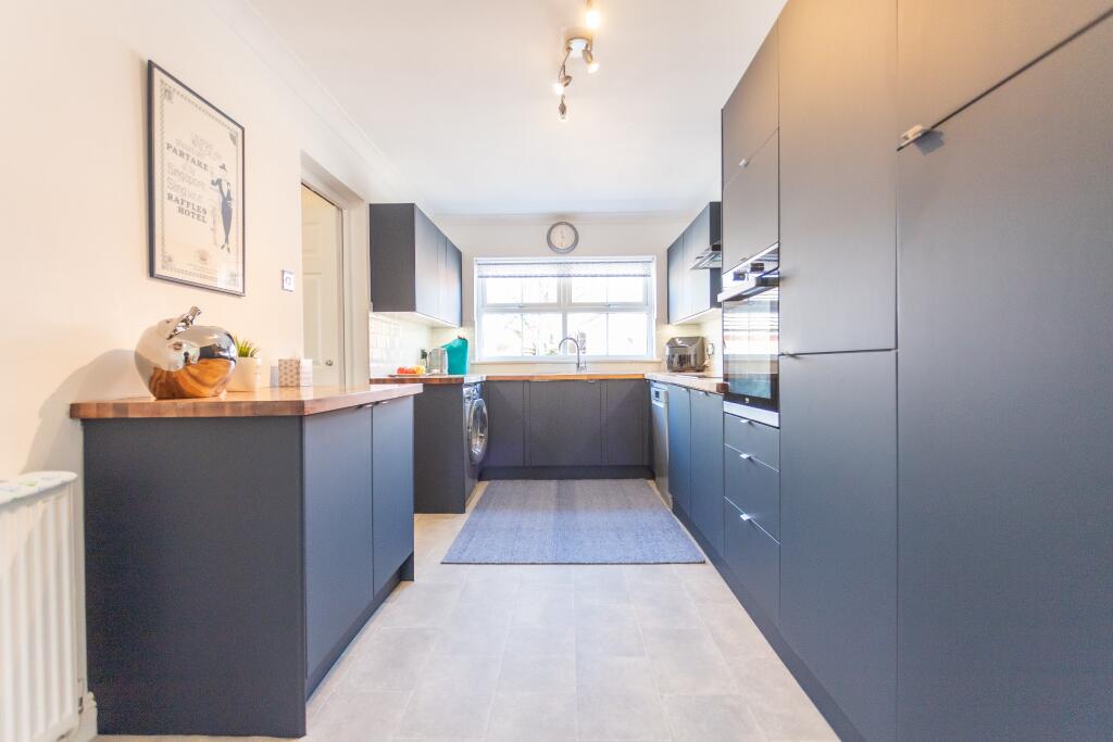 Modern Kitchen with doors to Dining Room
