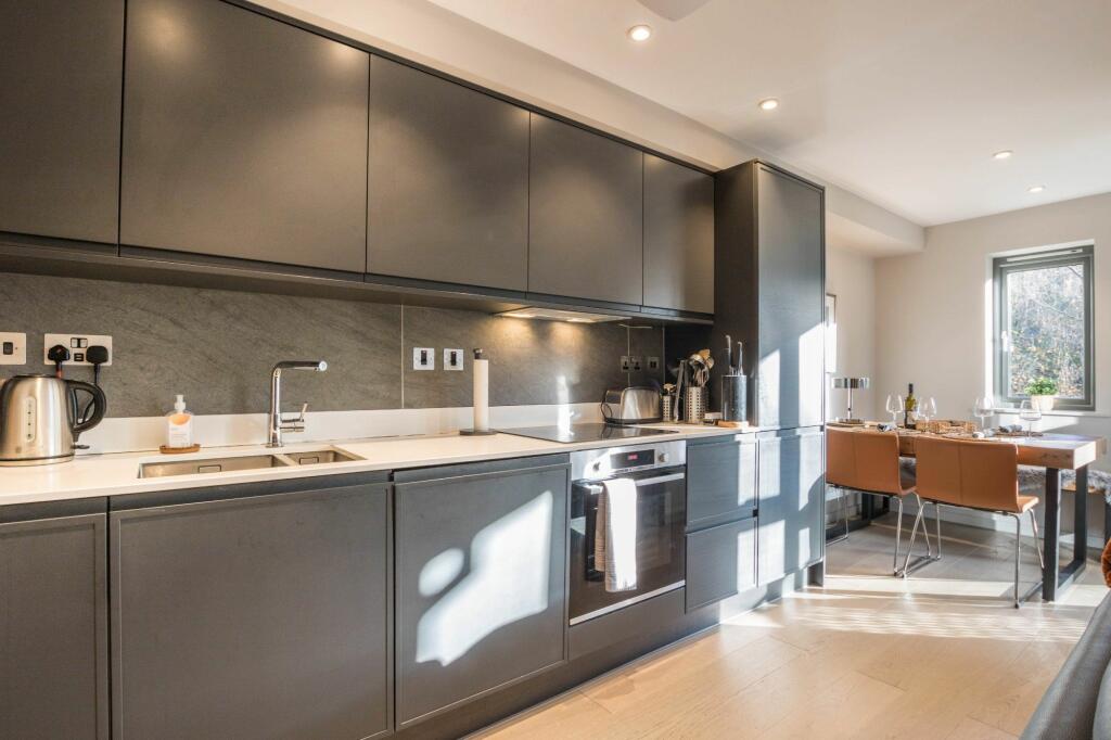 KITCHEN, DINING AND LIVING SPACE