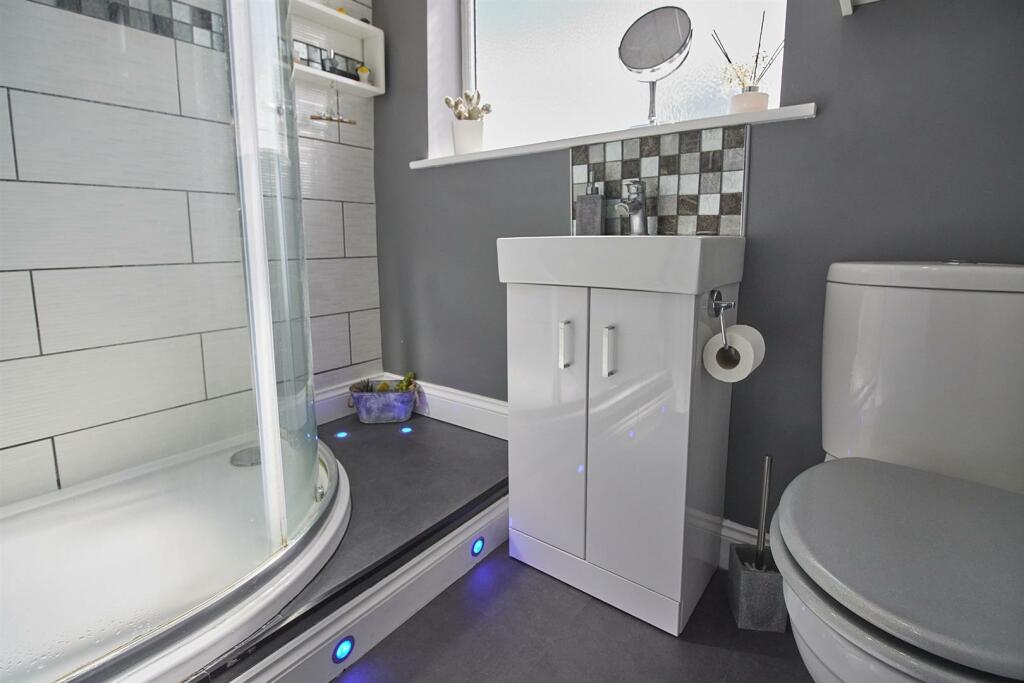 REFITTED SHOWER ROOM TO REAR