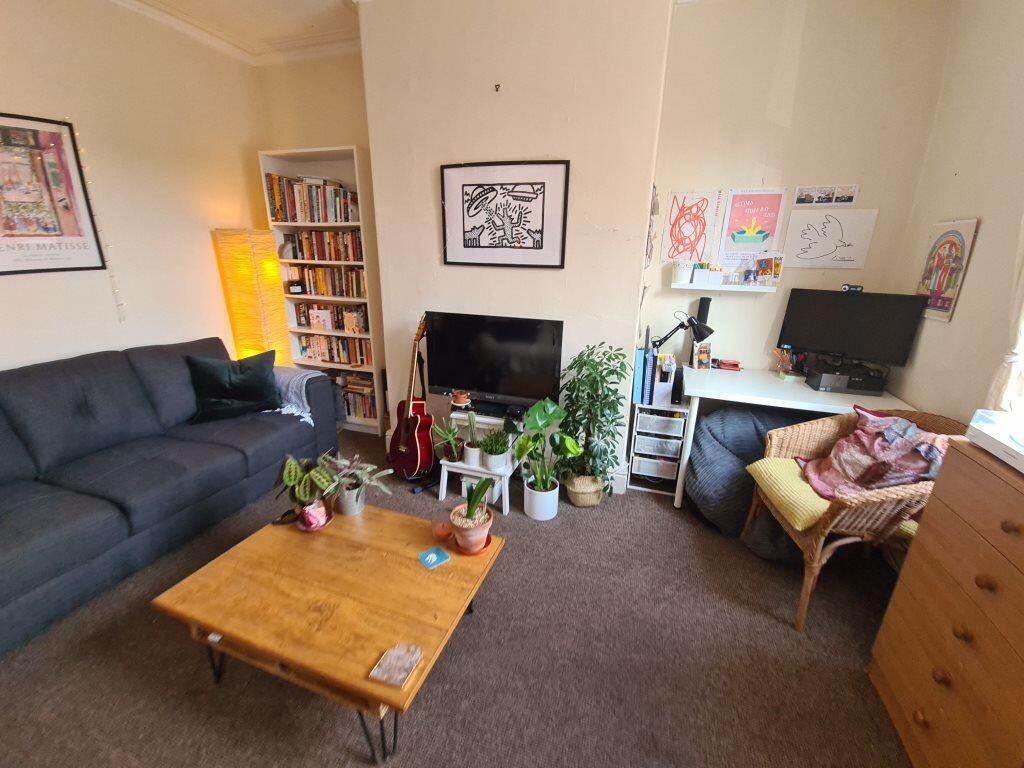 A cozy and inviting living room with comfortabl...