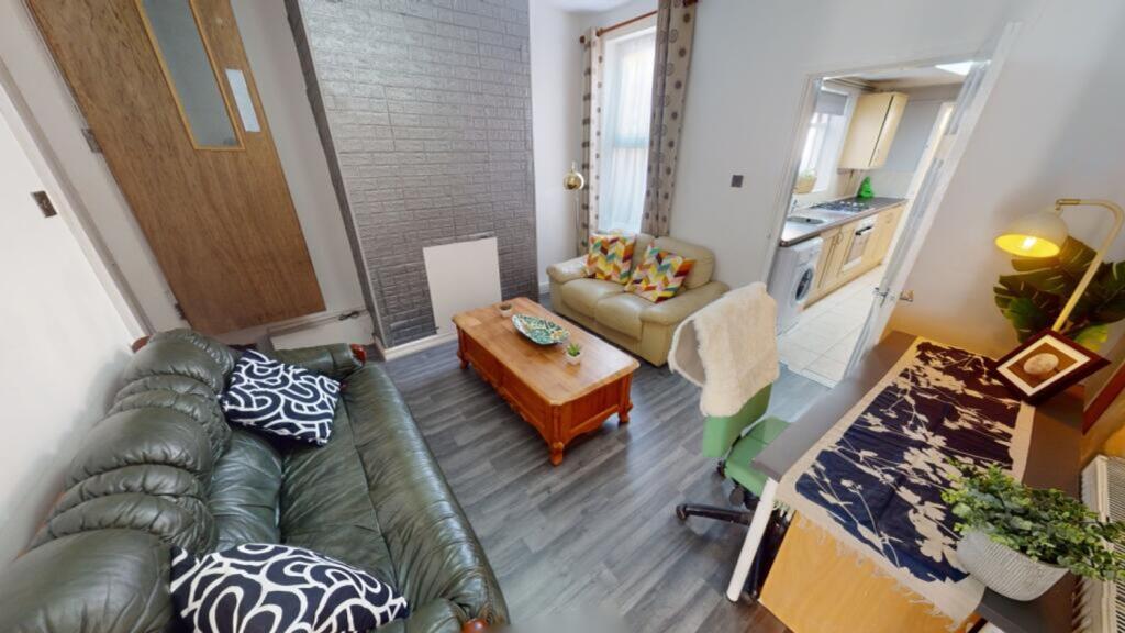 A spacious and inviting large modern living roo...