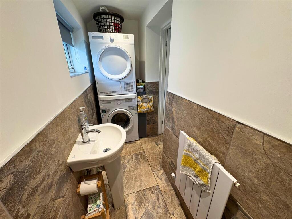 Cloakroom / Utility Area