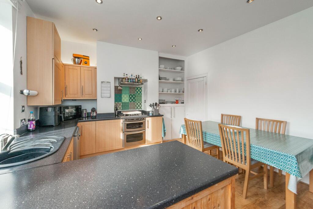 SITTING ROOM AND DINING KITCHEN
