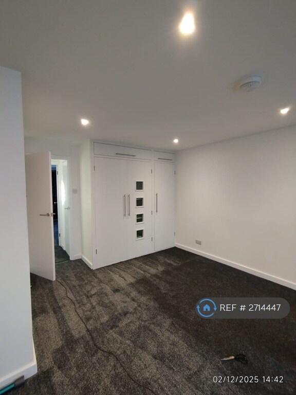 Lounge With Downlights And Smoke Alarm