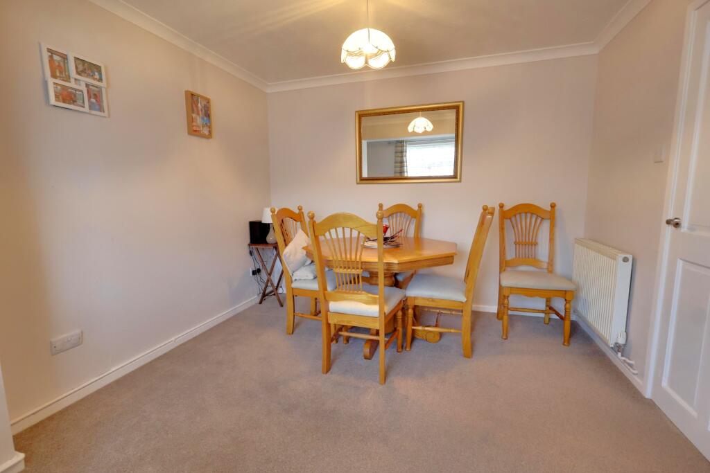 DINING AREA/FOURTH BEDROOM