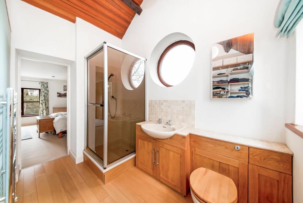 BEDROOM ONE EN-SUITE SHOWER ROOM