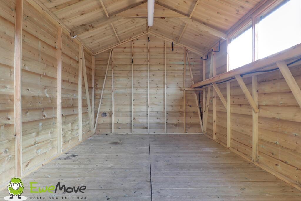 Rear garden at Hawthorn Close by Ben Brind EweMove