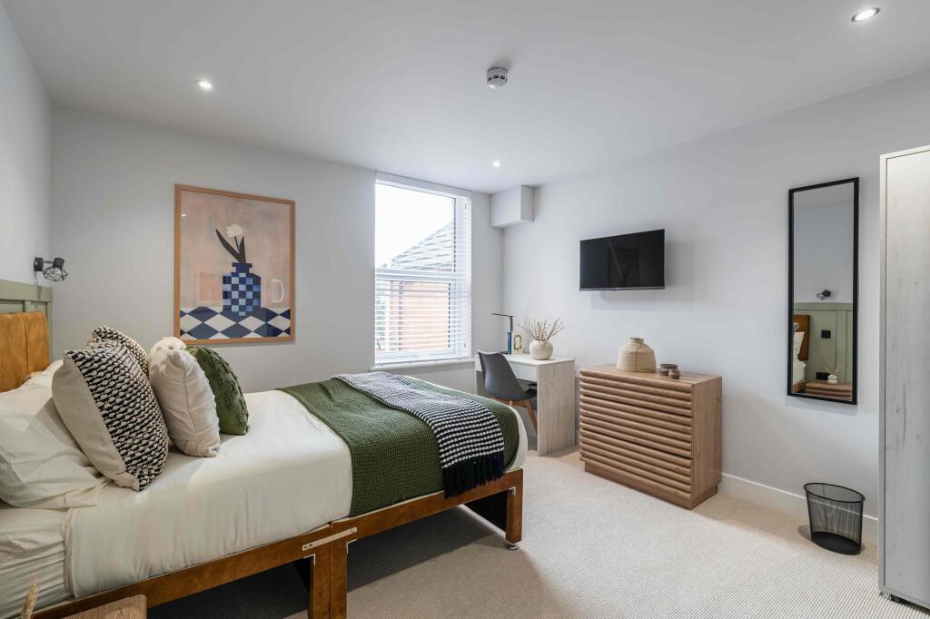 Bright and stylish living room with a comfortab...