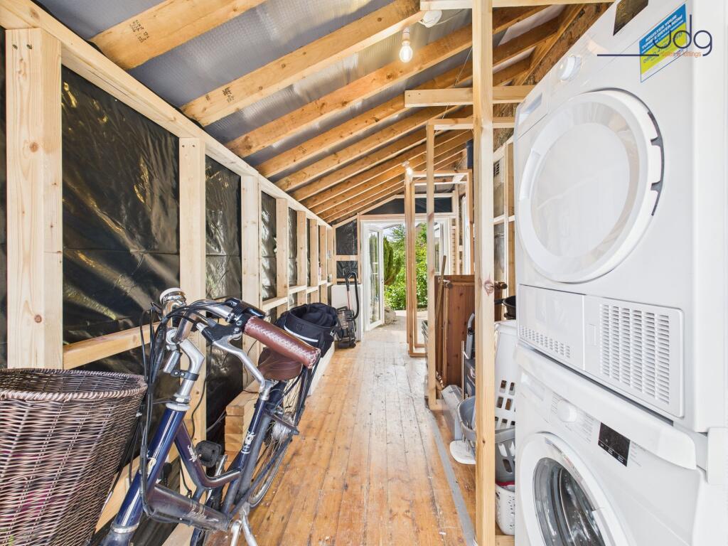 Integrated Garage, used as Utility Space with electricity