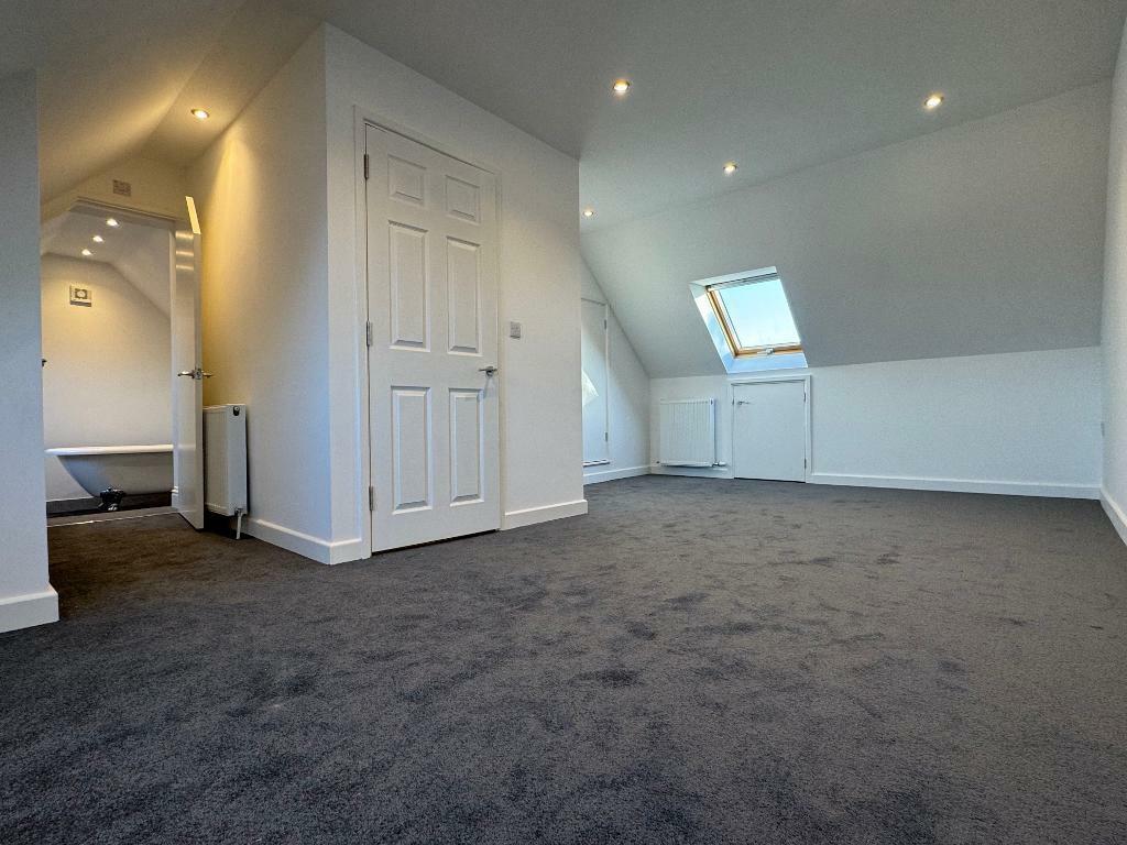 Main bedroom with fitted wardrobes