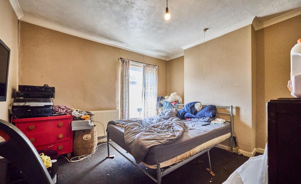 BEDROOM ONE TO FRONT