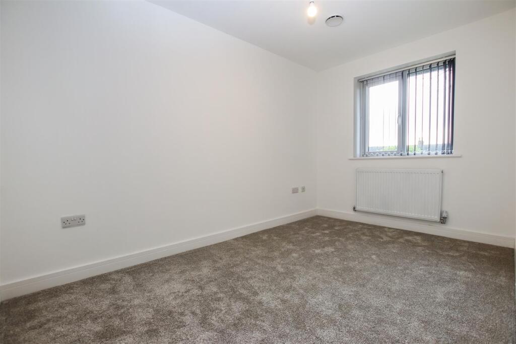 BEDROOM TWO (REAR)