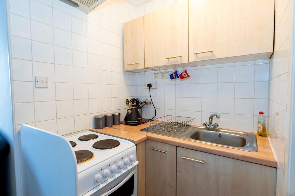 KITCHEN AND OPEN LIVING ROOM/DINER