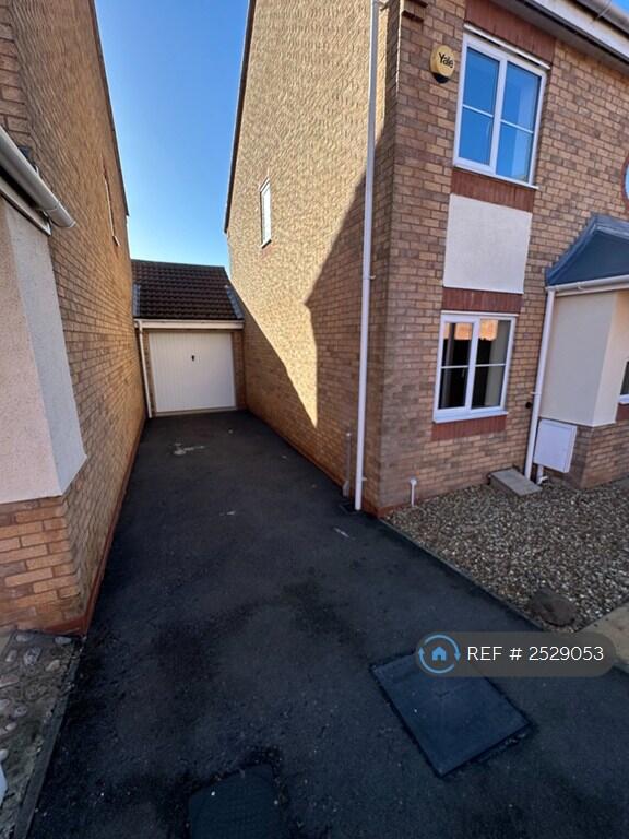 Side Driveway And Garage Front