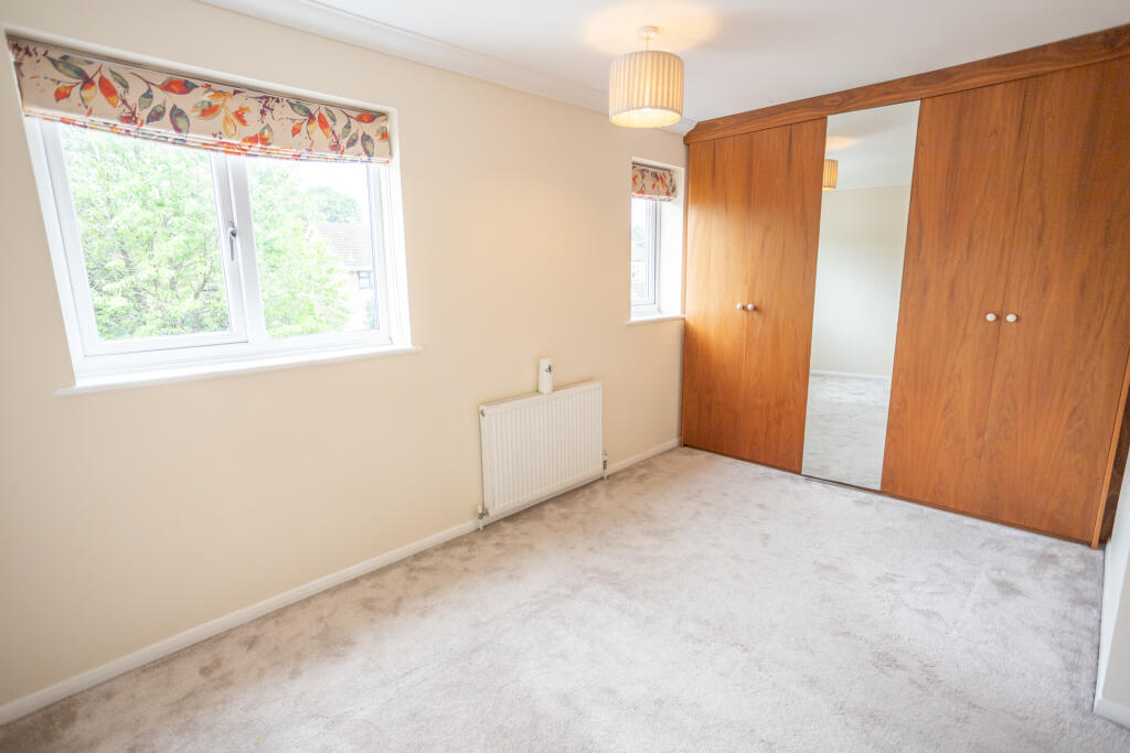 Bedroom 1 with wardrobes