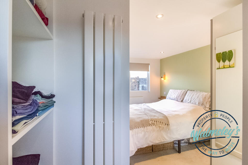 Built in storage in top floor bedroom