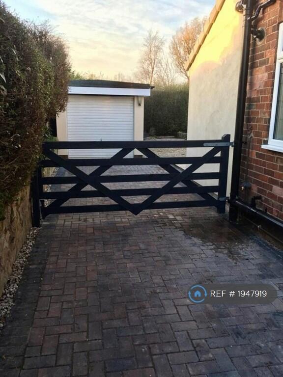 Gated Drive And Garage 